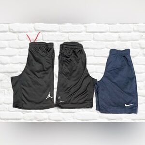 BUNDLE OF 3 SHORTS.1 NIKE NAVY BLUE. 2 NIKE  AIR  BLACK SHORTS. SIZE 7.